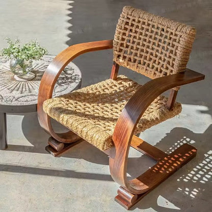 Fauteuil en rotin courbe vintage